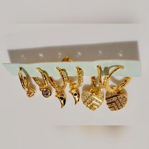 The 8OR Set of 4 Gold Tone Huggie Earings Accents with Crystals New